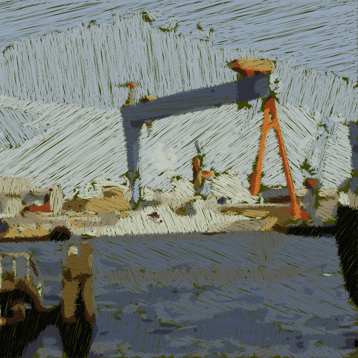 An image of a port, with a ship and a crane.